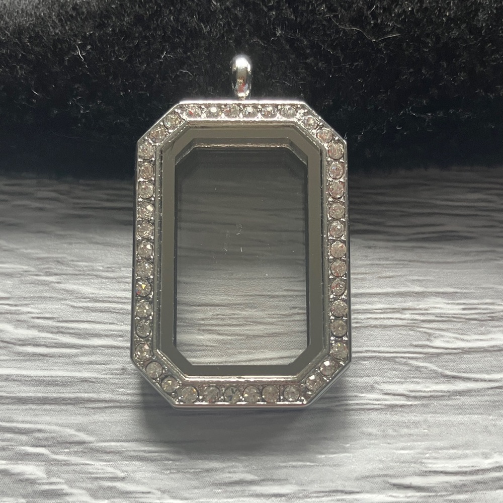 Rhinestone locket necklace.